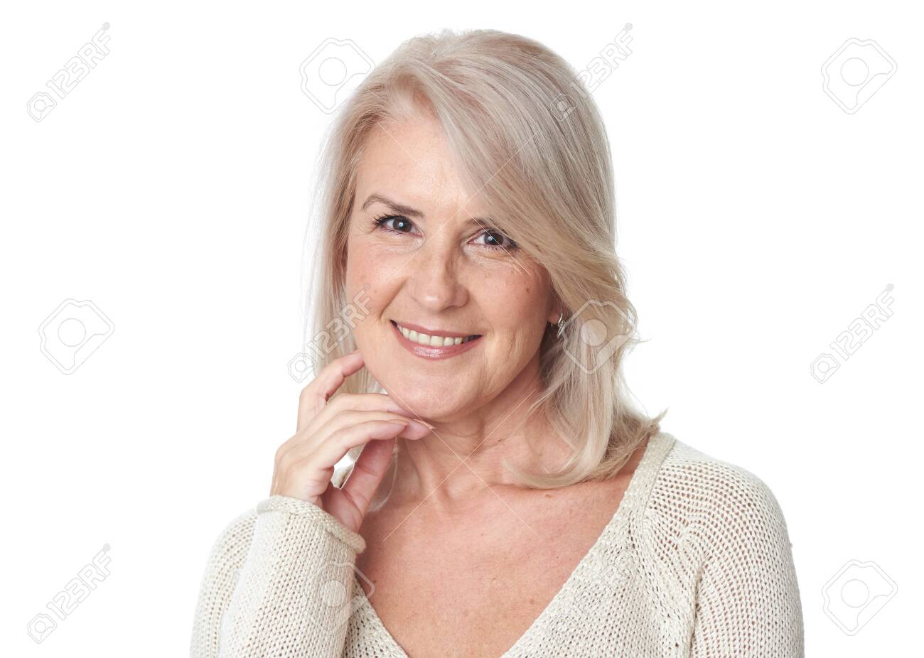 files/132470522-beautiful-50-years-old-woman-is-toothy-smiling-isolated-on-white.jpg