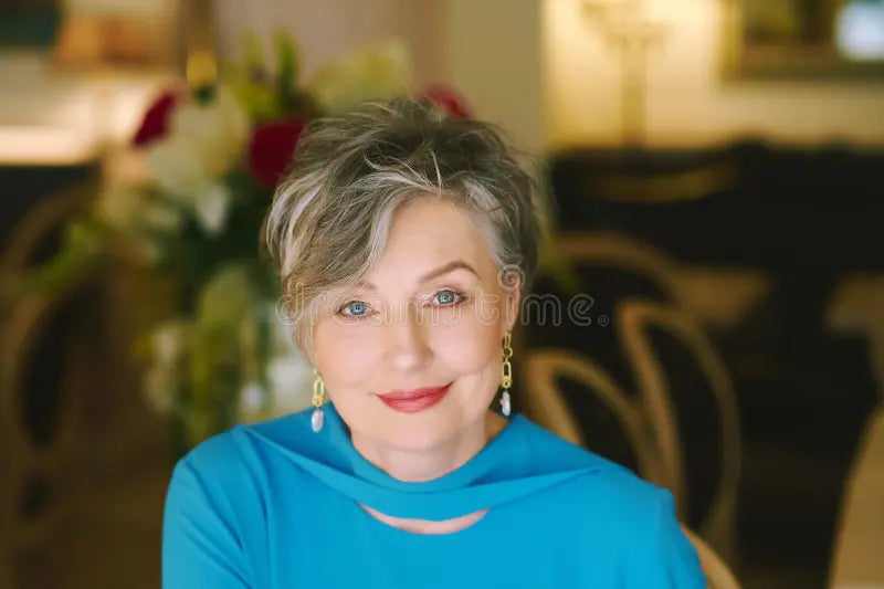 files/close-up-image-beautiful-year-old-woman-grey-hair-wearing-turquoise-blouse-portrait-beautiful-mature-year-old-woman-330253328.webp